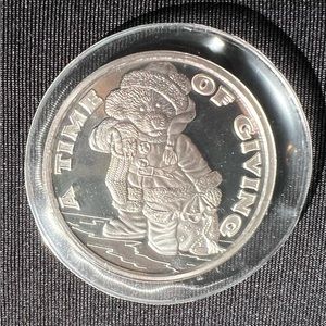 2001 A TIME OF GIVING: Christmas Coin. One Troy Ounce .999